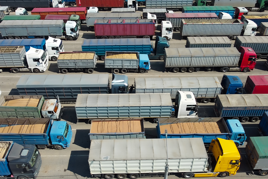Truck shipping containers leaving port