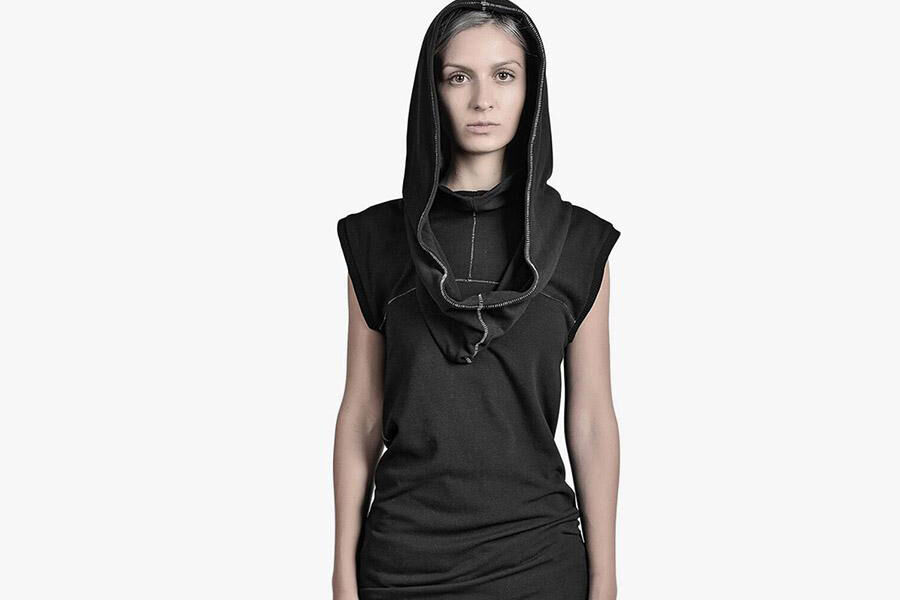Woman in a black hooded dress