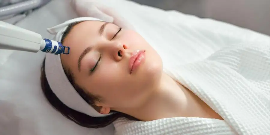 Women receiving laser beauty treatment
