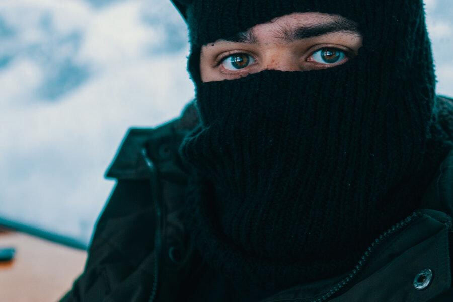Man posing with a black balaclava