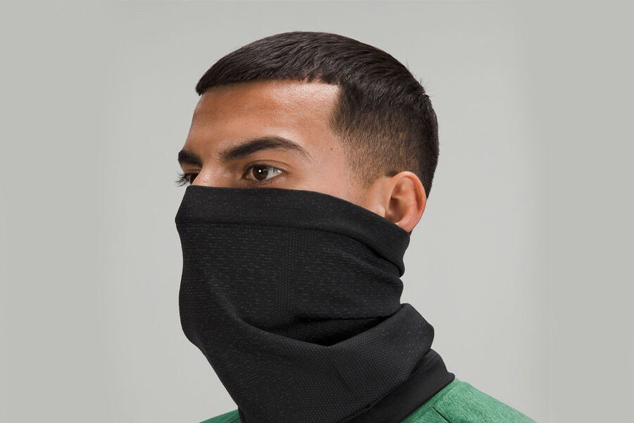 Man posing with a black tube