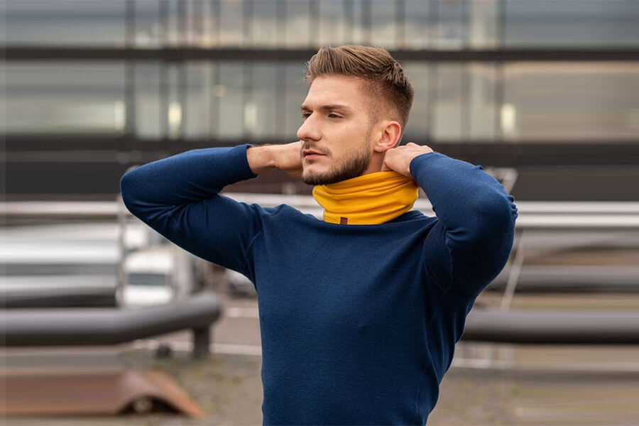 Man wearing a yellow neck gaiter