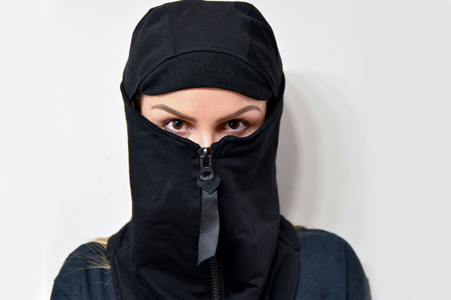 Woman rocking a black convertible balaclava