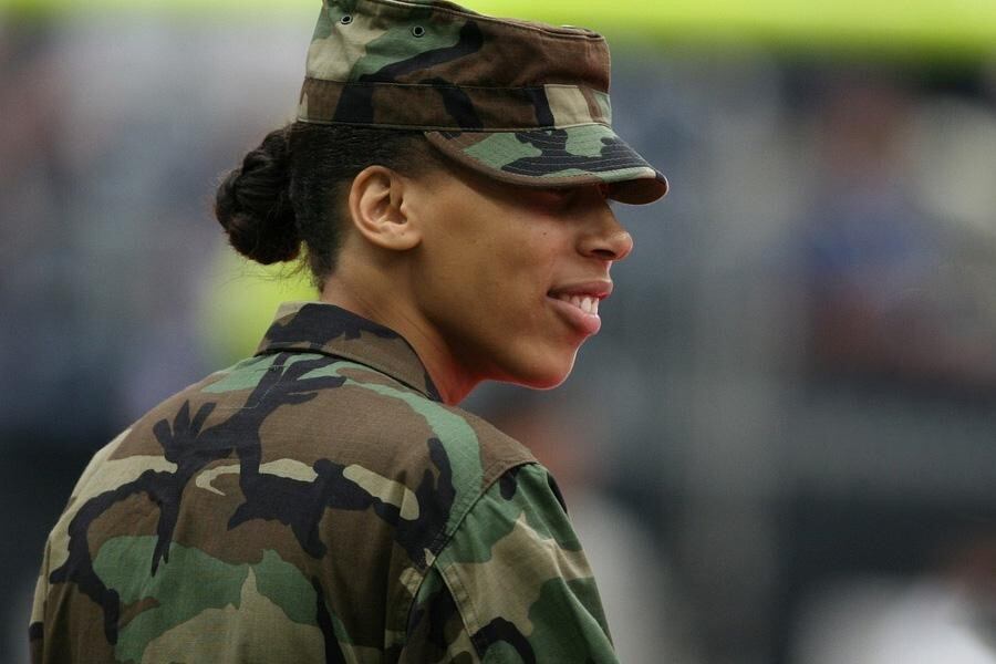 Woman wearing a full camouflage outfit