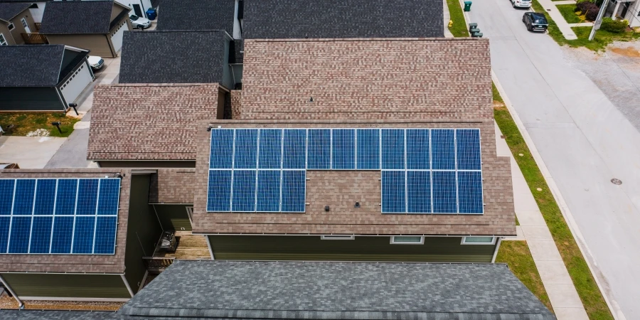 Solar panels on a tiled roof of a house