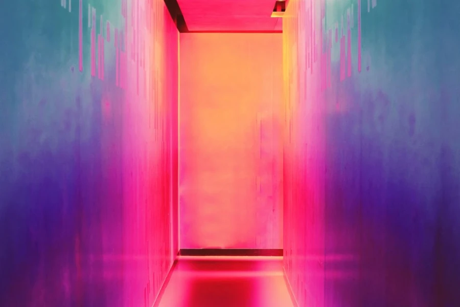A hallway illuminated in different colors