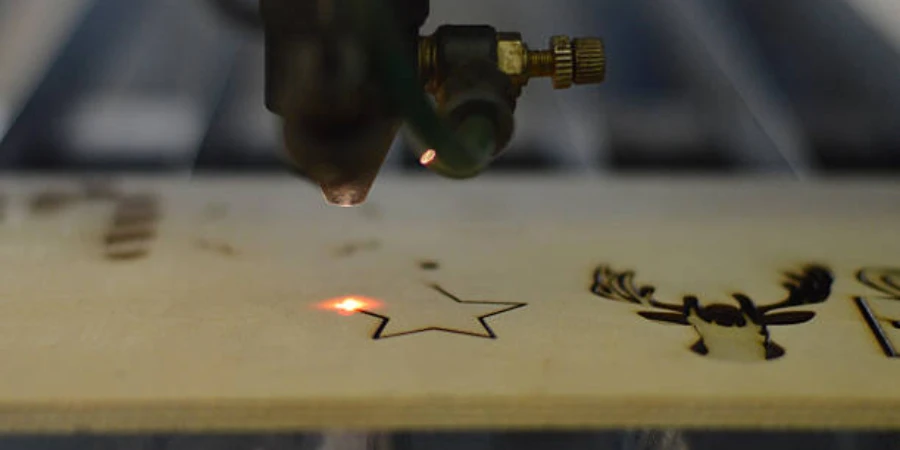 A laser cutting machine putting designs on a plywood