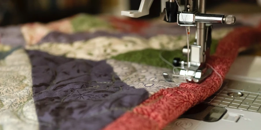 A quilting machine stitching a multicolored rug