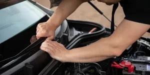 A technician diagnosing a suspension failure