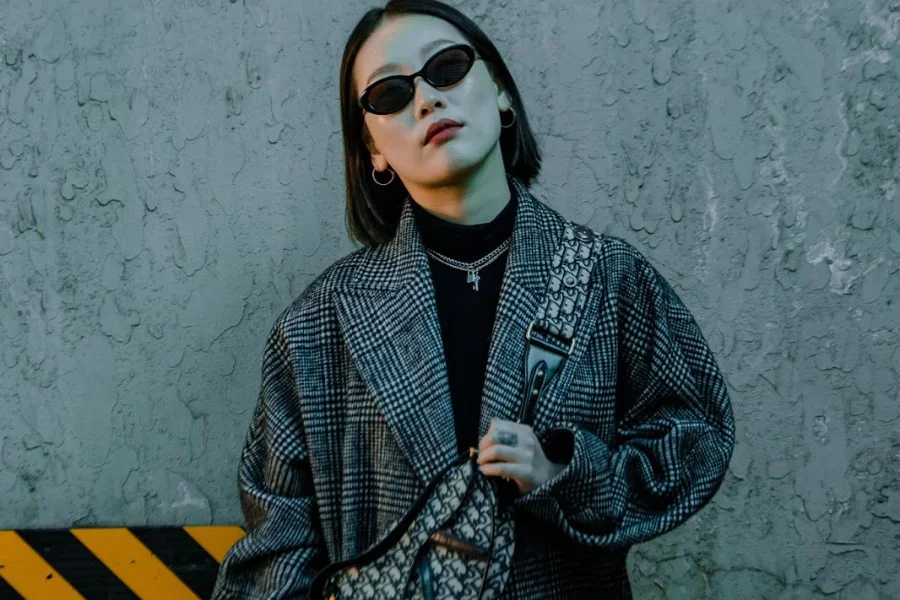 Woman rocking a gray plaid jacket