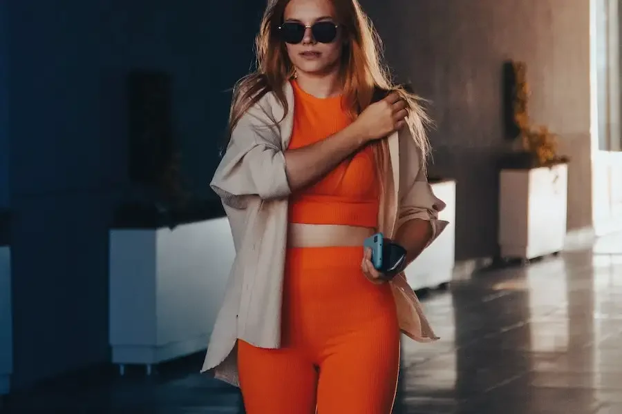 Woman rocking an orange ensemble