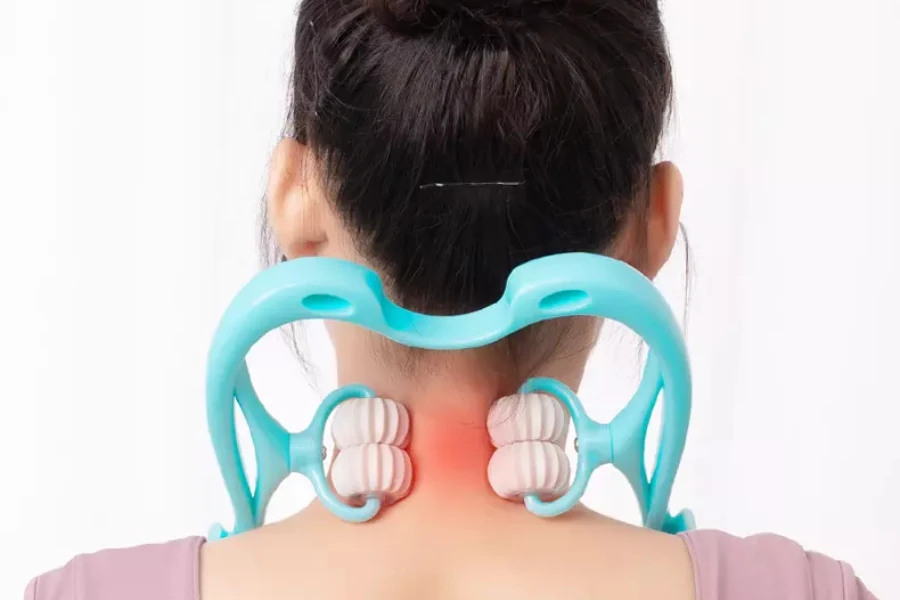 Woman wearing blue neck roller to massage neck area