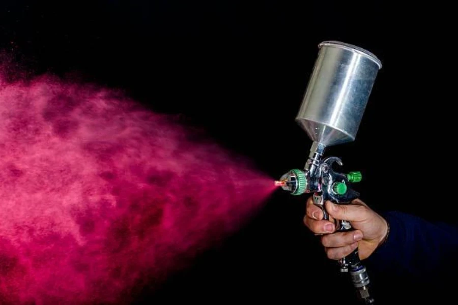 A spray gun during operation