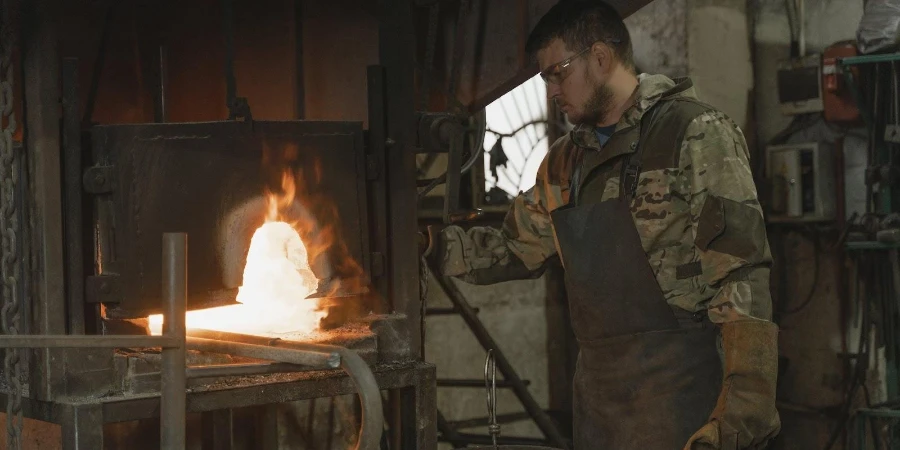 Blacksmith doing metal forging in a workshop