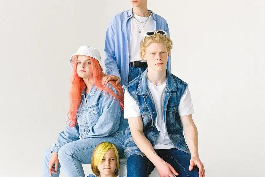 Group of people rocking denim outfits in different shades