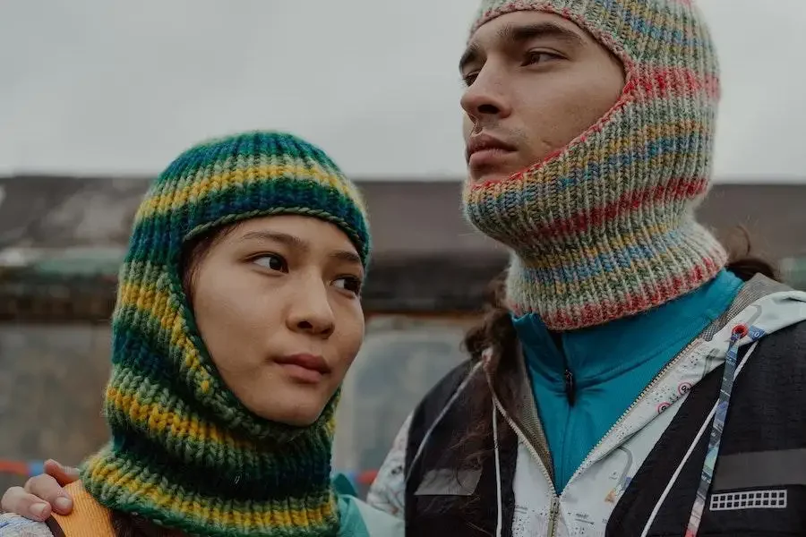 Man and woman rocking wool balaclavas