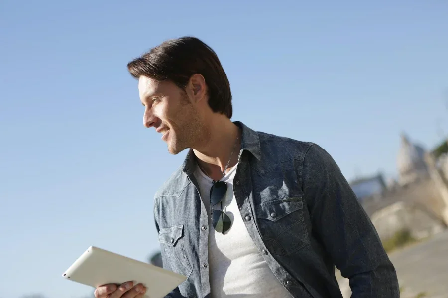 Man wearing a blue denim shirt