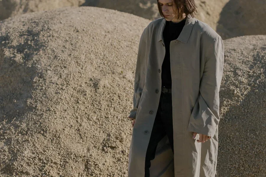 Man wearing a gray colored oversized shirt