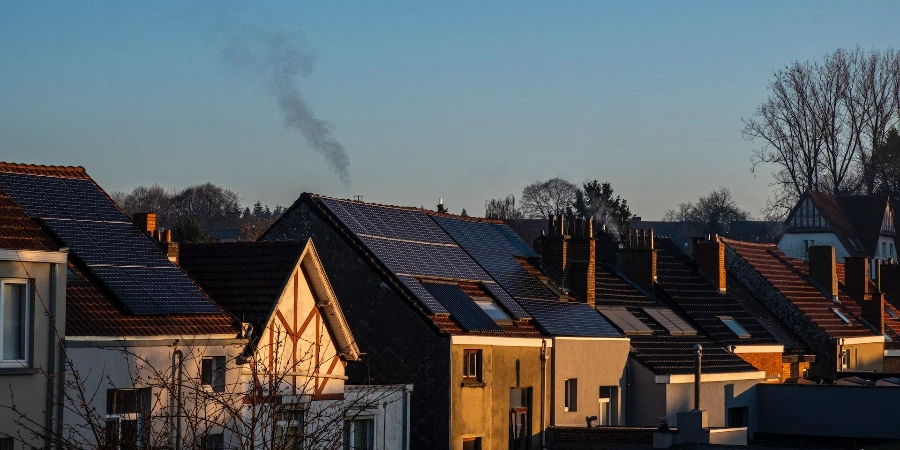 Houses with solar panels on roofs