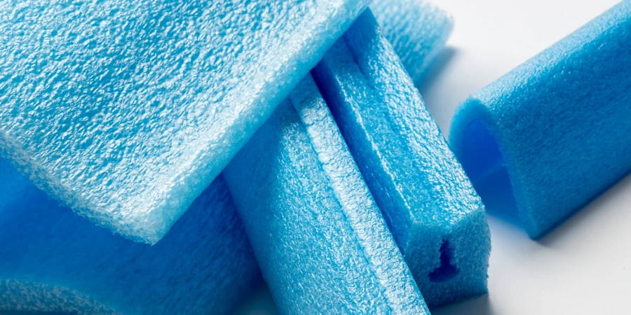pieces blue polyethylene foam on a white background