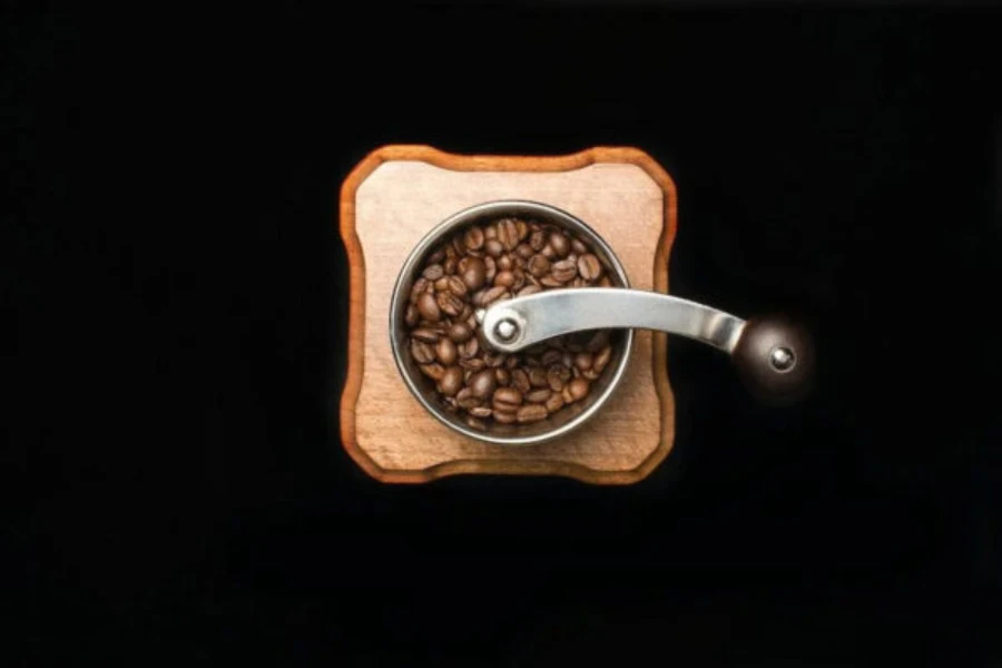 A manual coffee bean grinder ready for use