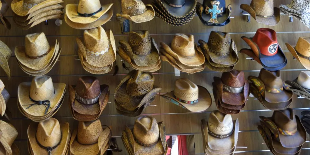Cowboy hats of different shapes, sizes, colors and styles