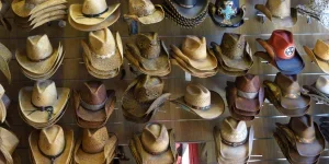 Cowboy hats of different shapes, sizes, colors and styles