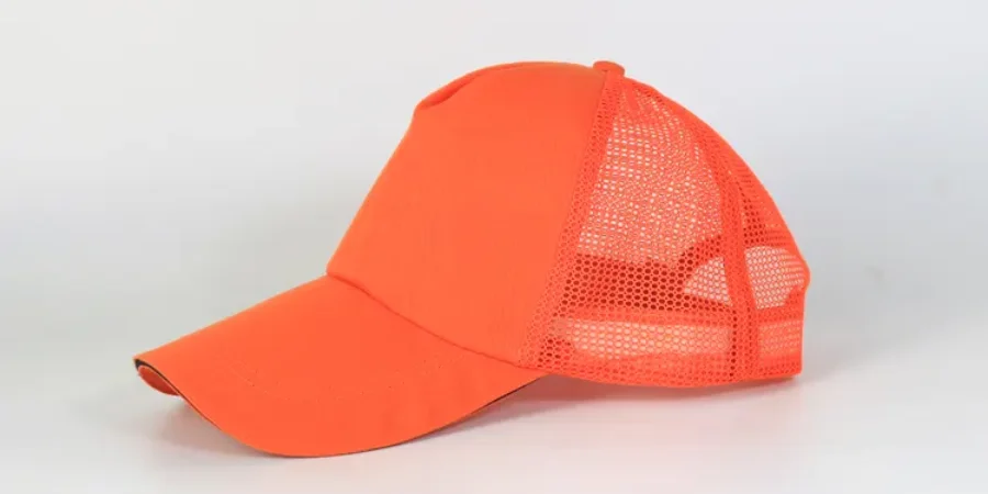 Orange trucker hat on a white background