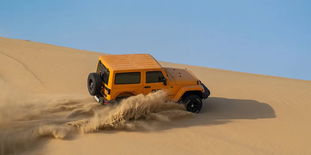a car driving in a desert