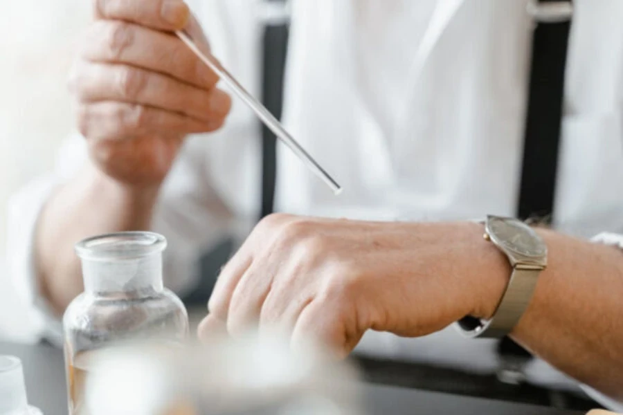 A perfumer testing his fragrance composition