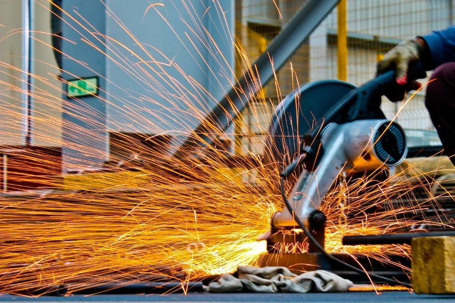 A person operating a wire cutting machine