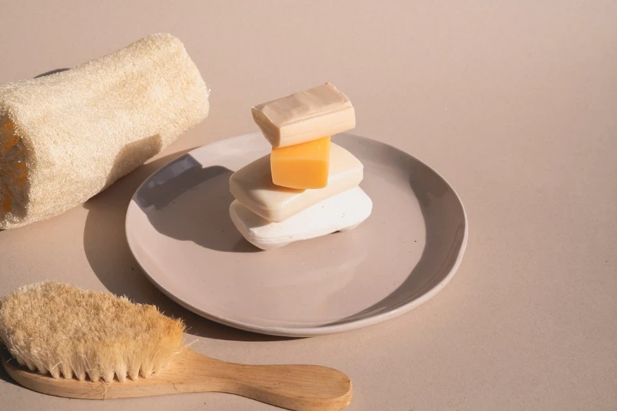 A stack of bar soaps on ceramic plate