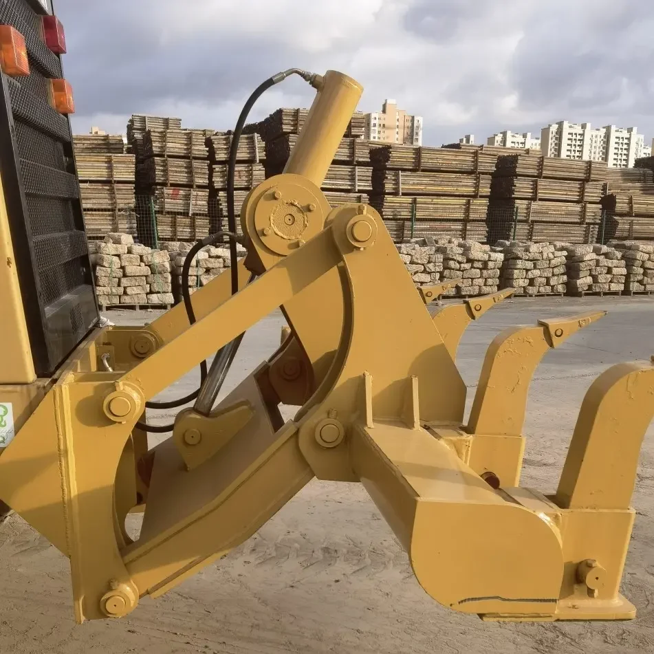 Check the front loader bucket and rear ripper