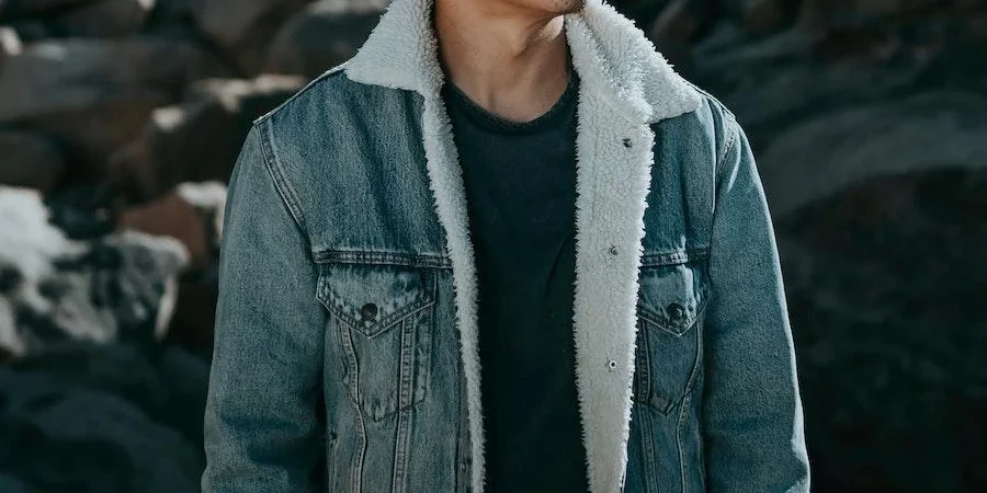 Man wearing a trendy jean jacket