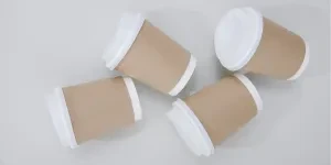 Paper cups of coffee on a table