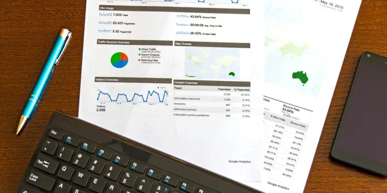 sales charts on a paper and keyboard