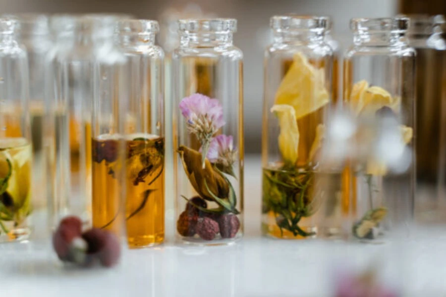 Several bottled fragrances containing different formulations