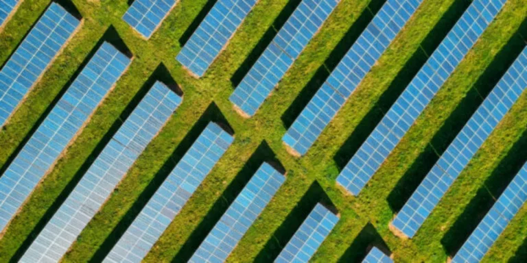 Solar panels on a green field