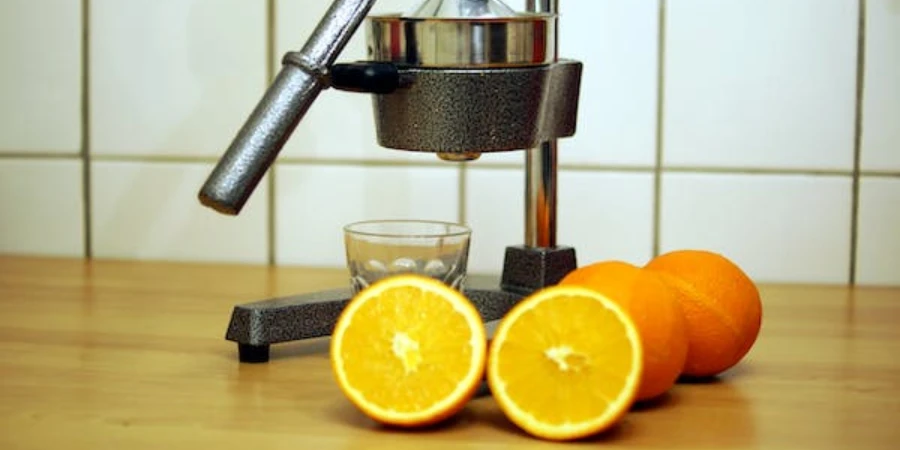 A close-up shot of a juicer pressing oranges