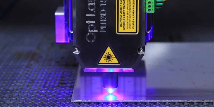A laser machine with purple and blue light