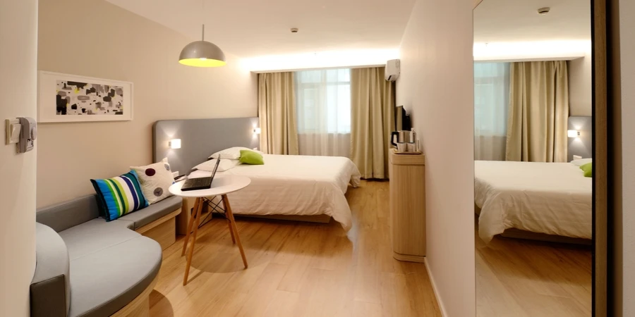 A modern bedroom with hardwood floor