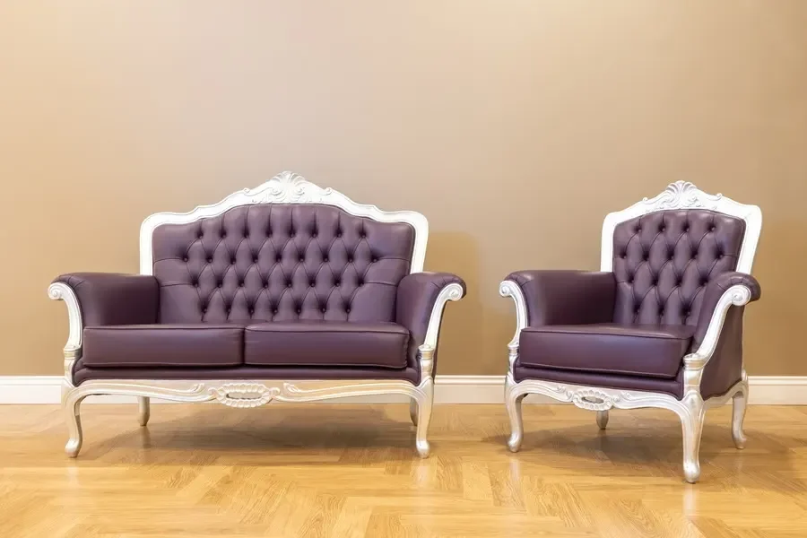 Two upholstered chairs and hardwood floor