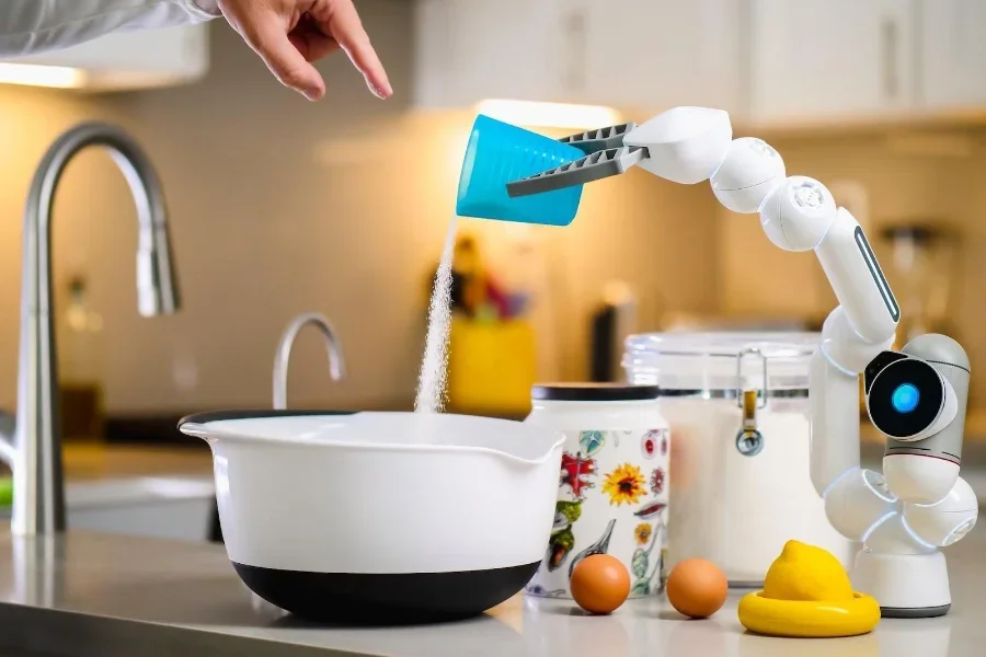 A white robot arm pouring sugar into a white bowl