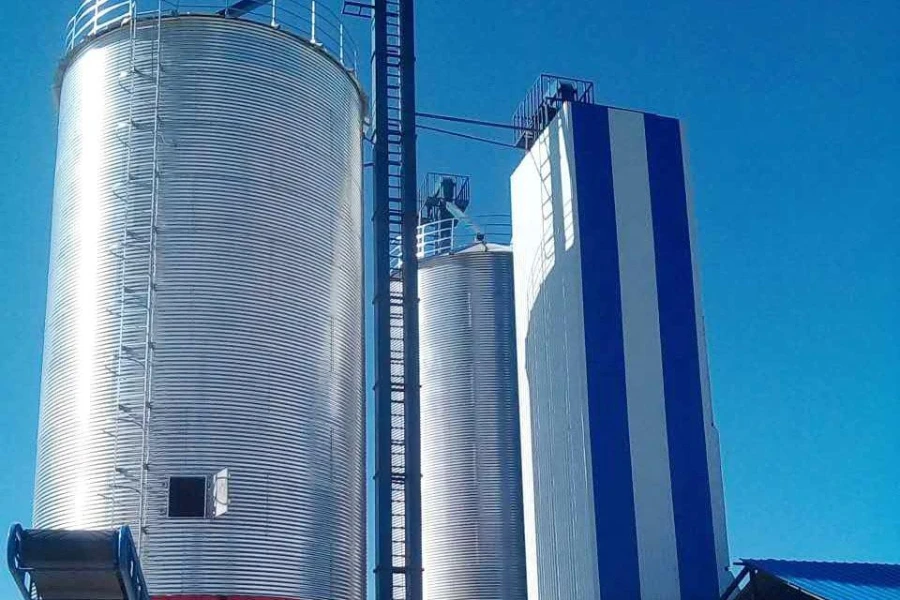 Continuous flow grain dryer tower
