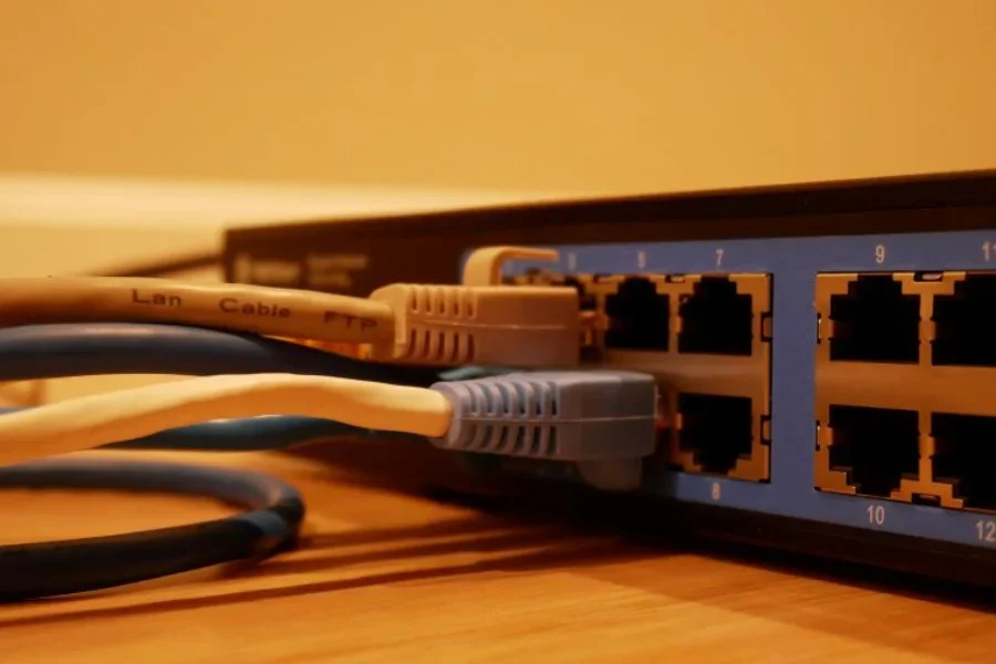 Ethernet cables going into a router