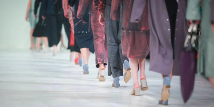 Models walking on a fashion runway