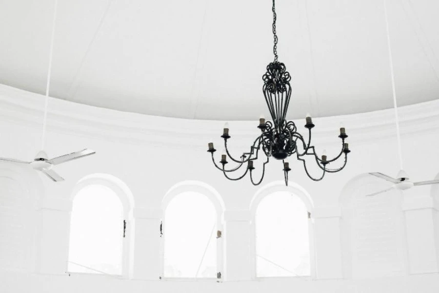 White room with black chandelier