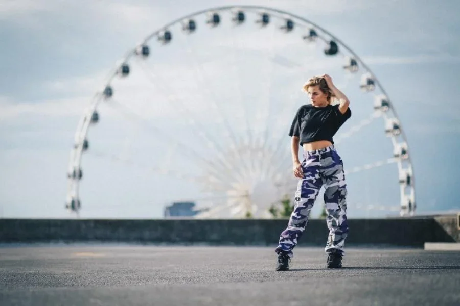 Woman in gray camo combat pants