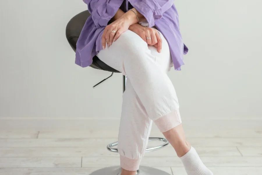 Woman wearing light pink joggers