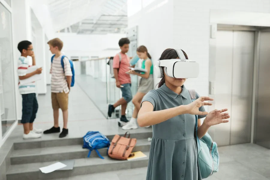 Young person with a VR headset with other young people in the background